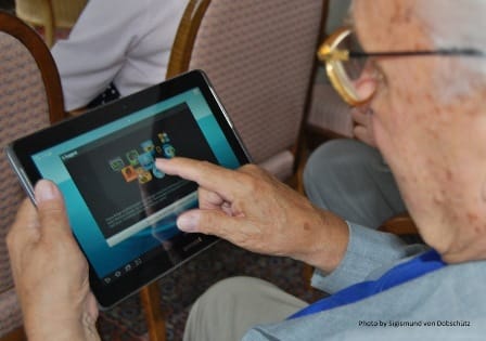 Senior using a tablet